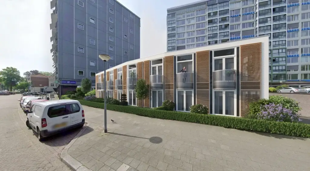 Zijaanzicht van Loolaan Royaal met balkons en groene tuin